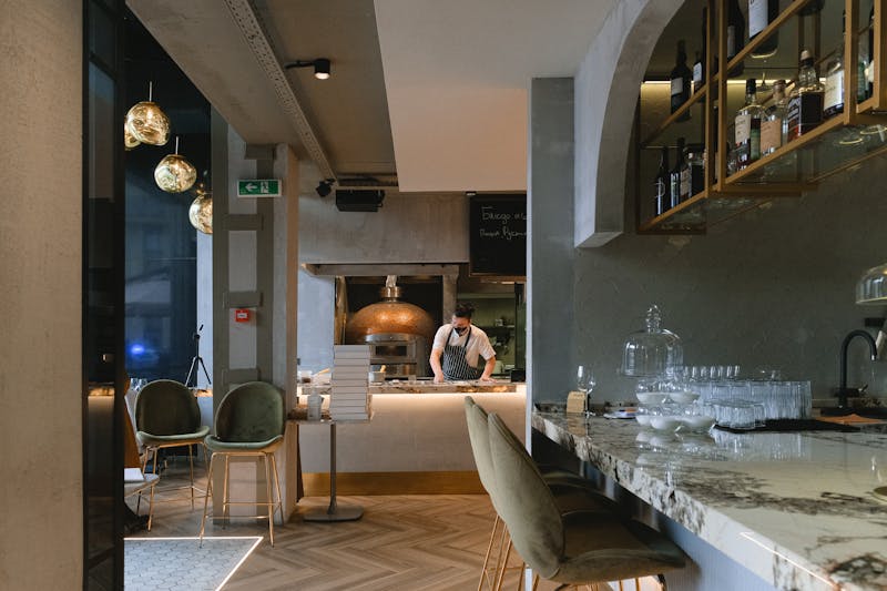 Inside Pizzana restaurant in Dallas — warm ambiance and welcoming atmosphere