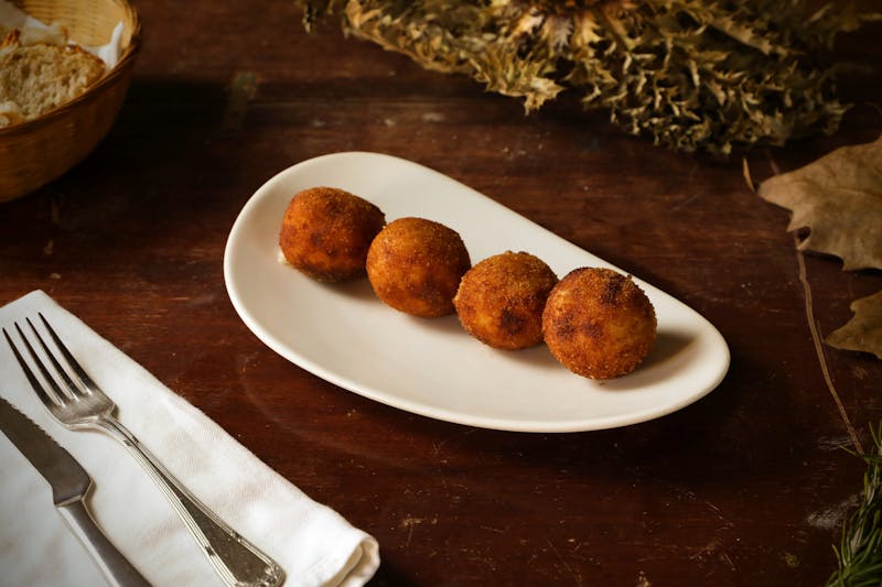Crispy Arancini rice balls with marinara dipping sauce