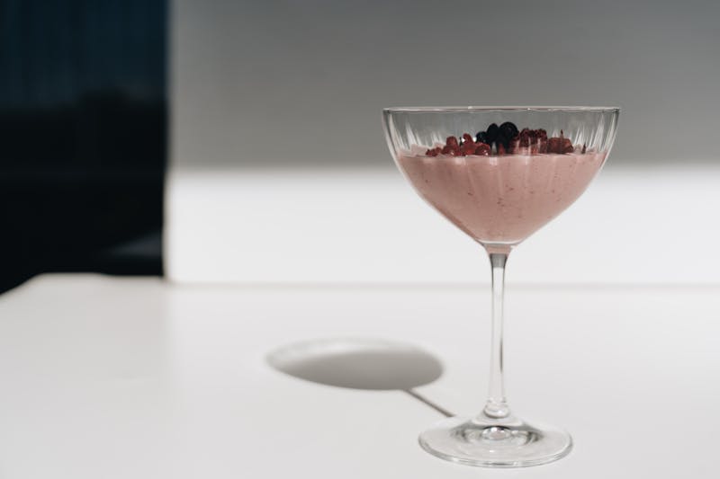 Creamy Panna Cotta with mixed berry coulis